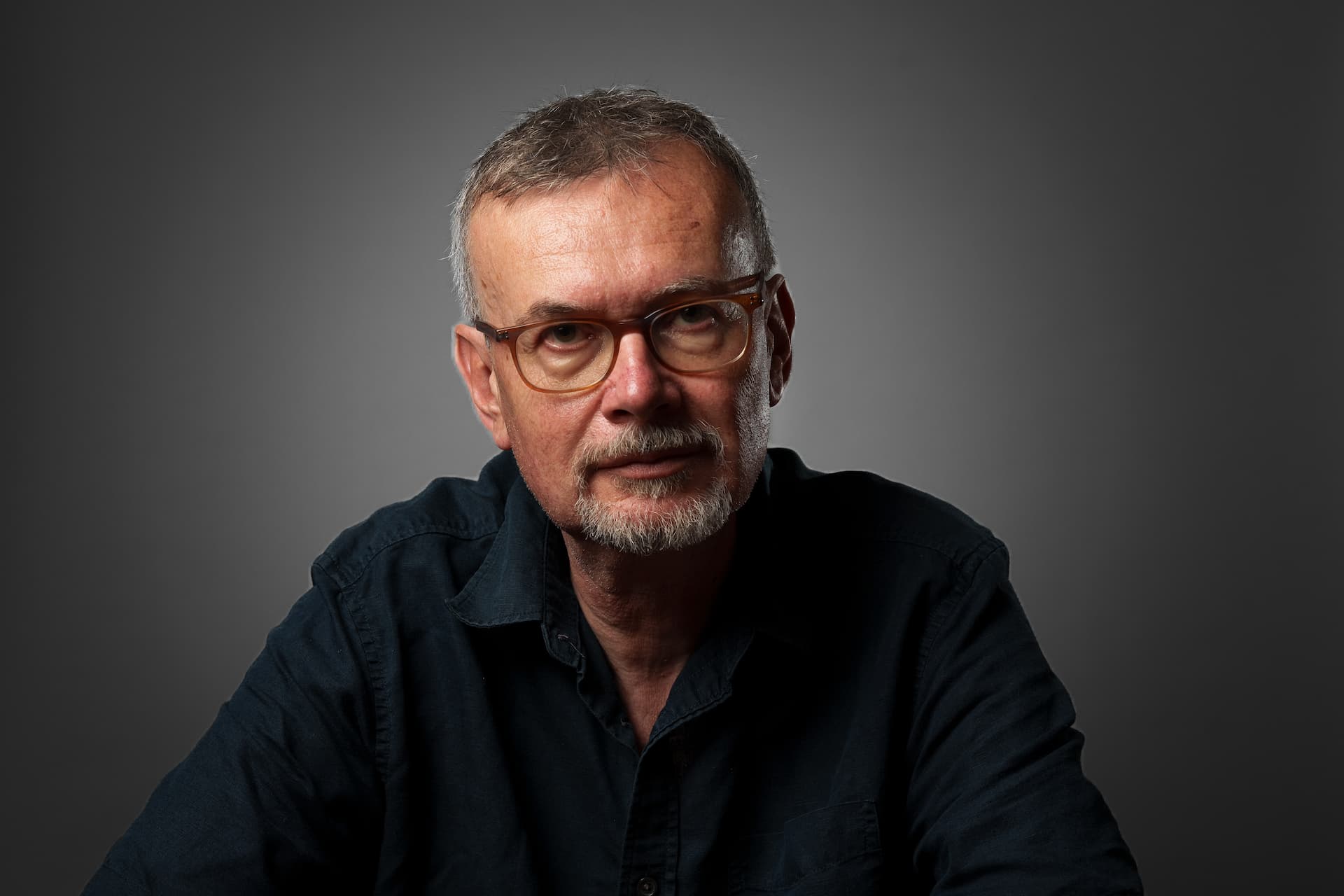 portrait of a white male grey backrground